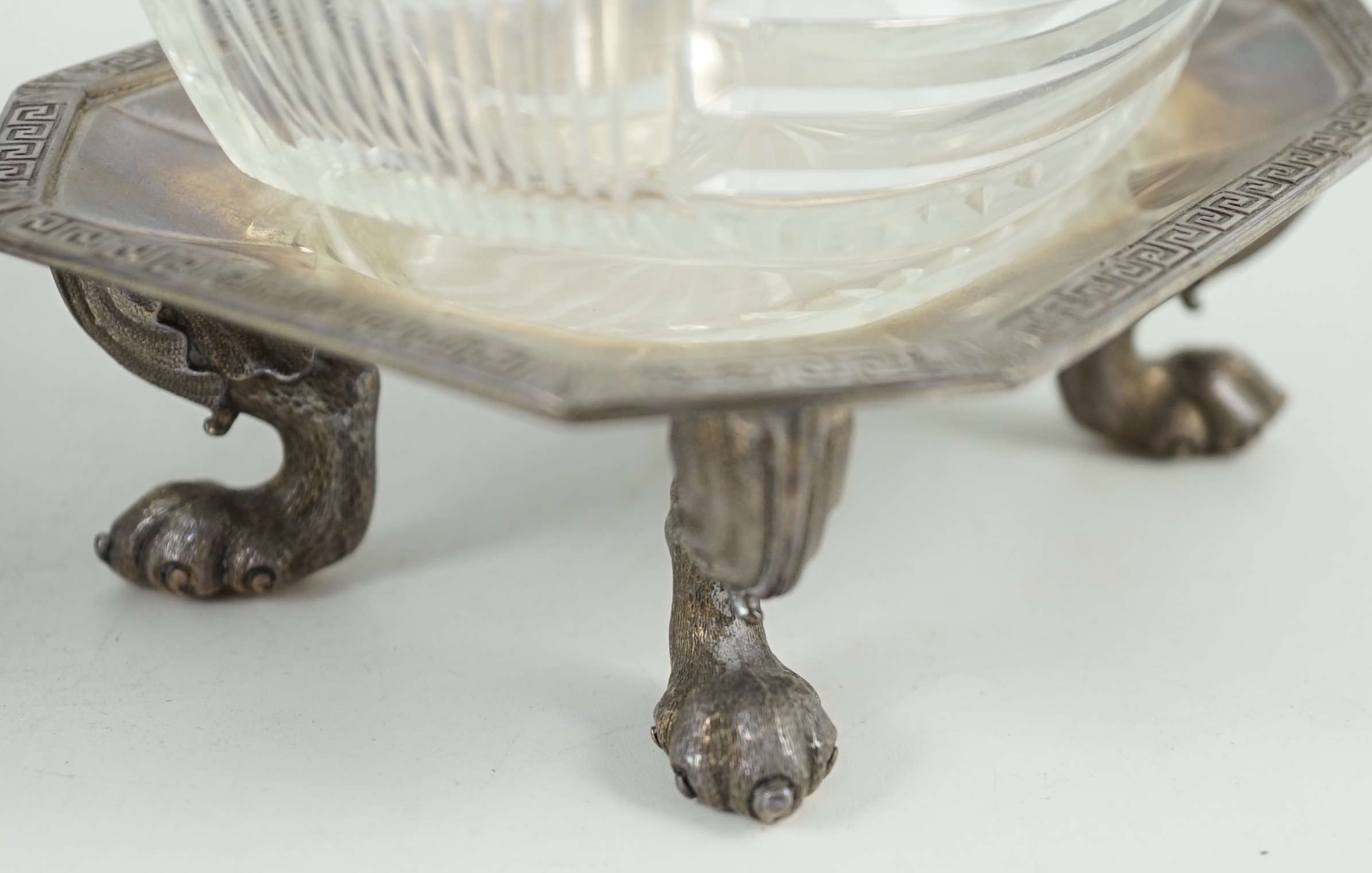 A pair of George V silver salt cellars, with cut glass liners